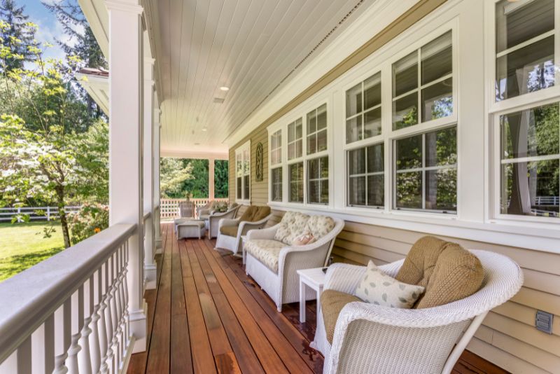 wooden verandah with lounge sofas