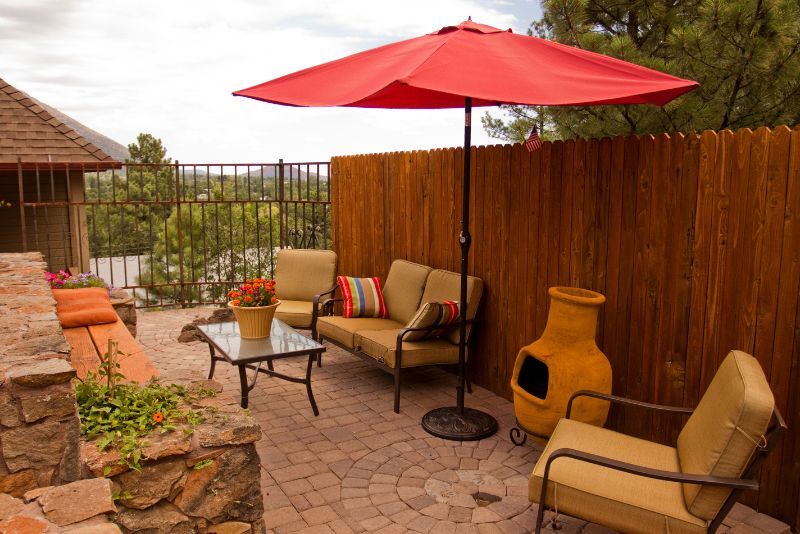 Well-maintained paver patio with regular cleaning to prevent cracking and water damage